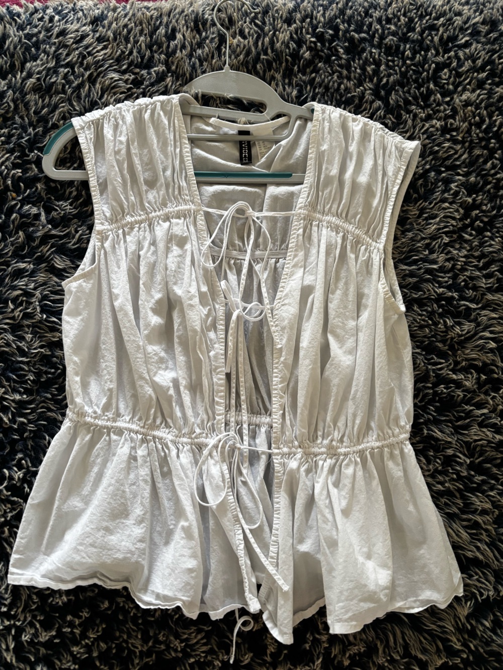 Divided White Sleeveless Peplum Tie-Front Blouse